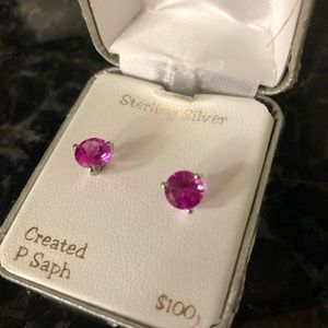 Pink sapphires stud pierced earrings.  Sterling silver posts four prongs.